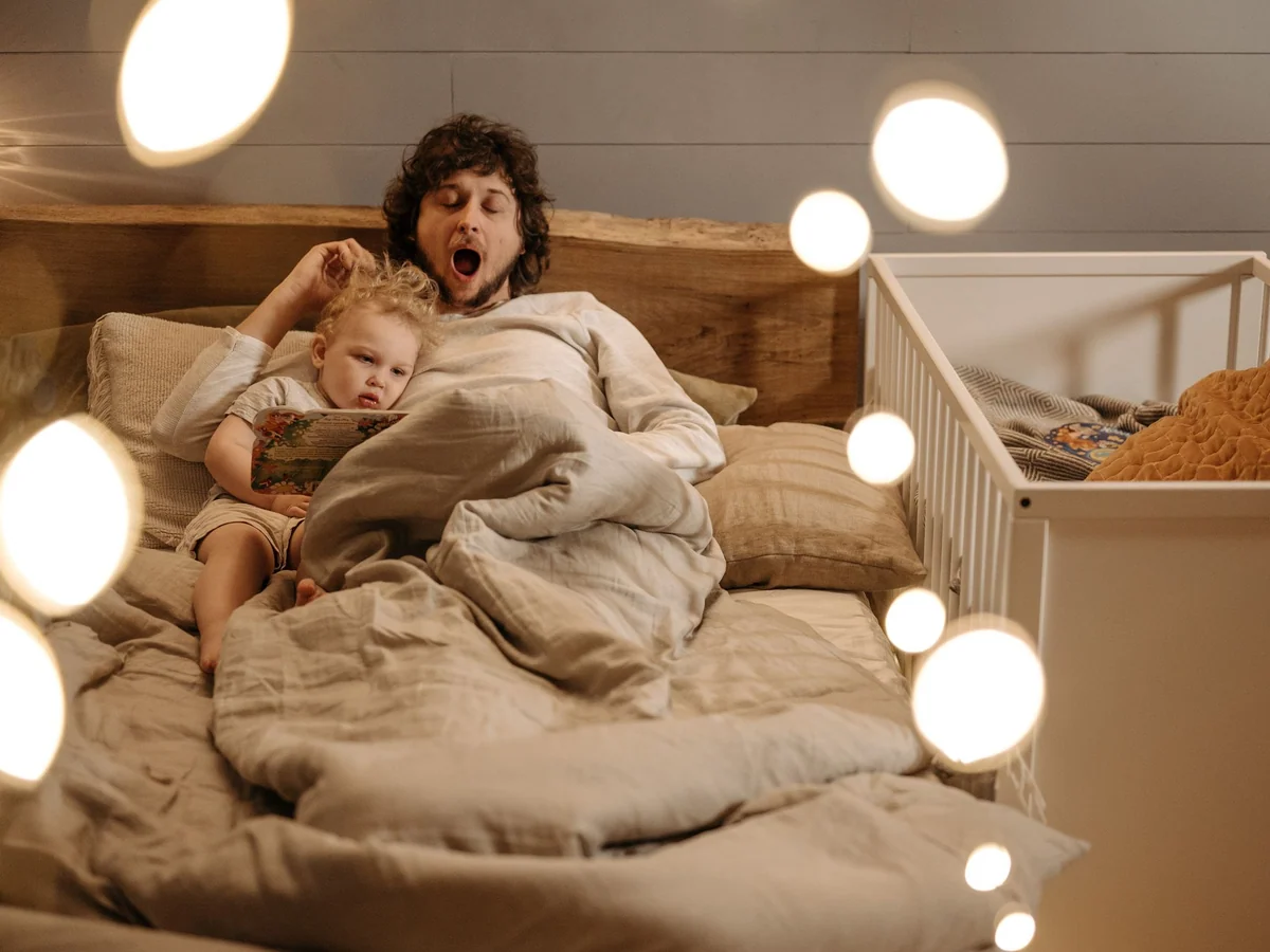 Woman reading quietly in a calm bedroom before sleep